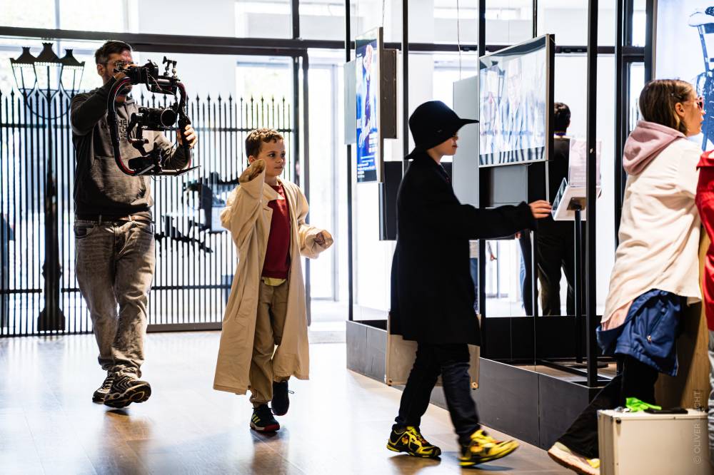 Aufnahmen von Dreharbeiten einer Plansequenz im Foyer des Filmmuseums